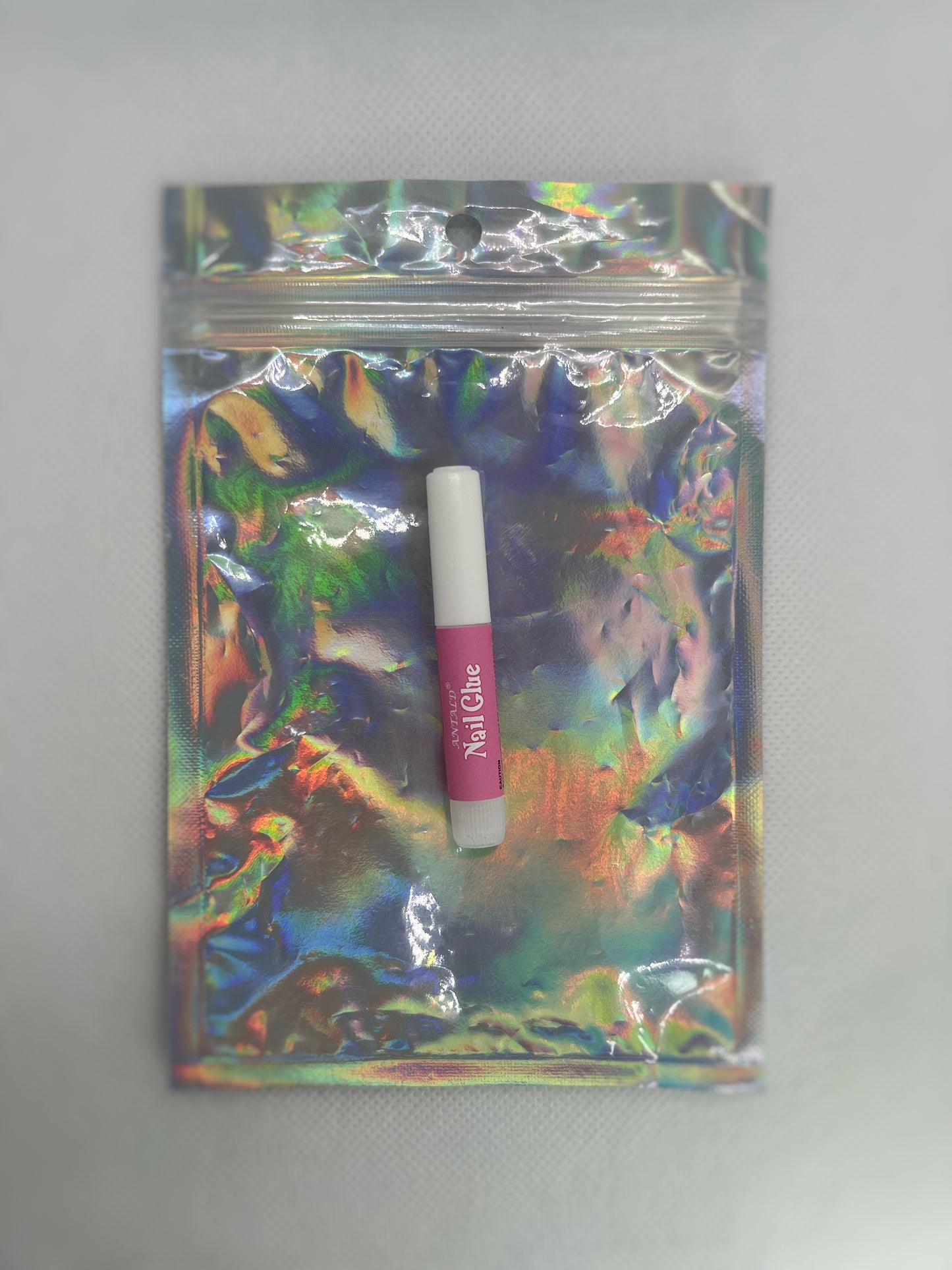 Colle à faux ongles